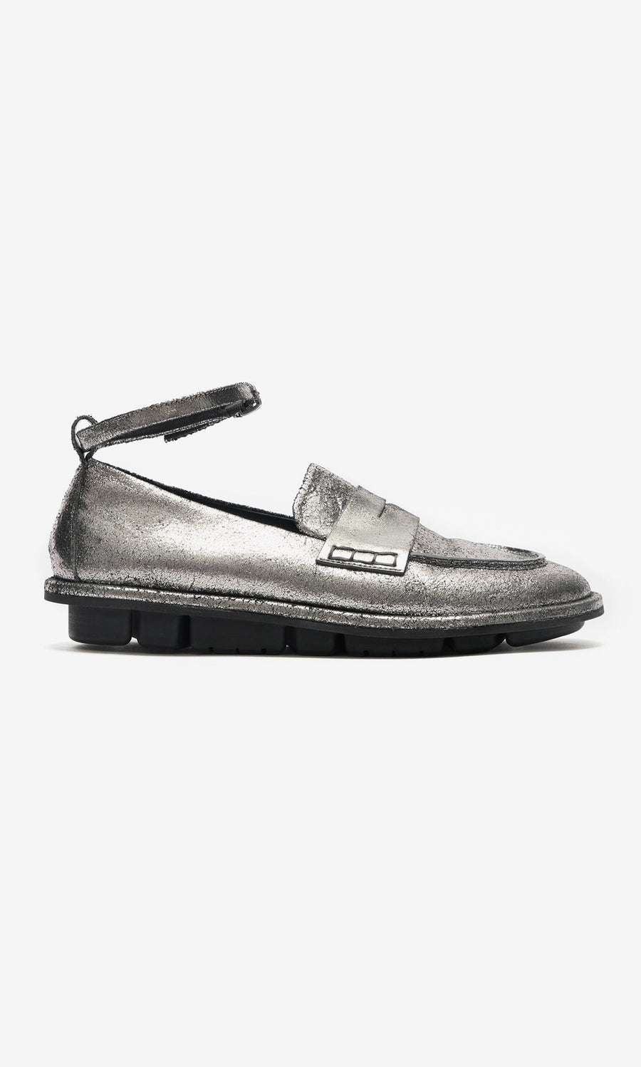 Plümo- Silver Loafers in metallic leather feature detachable ankle straps and a thick black sole, shown in side profile on white.
